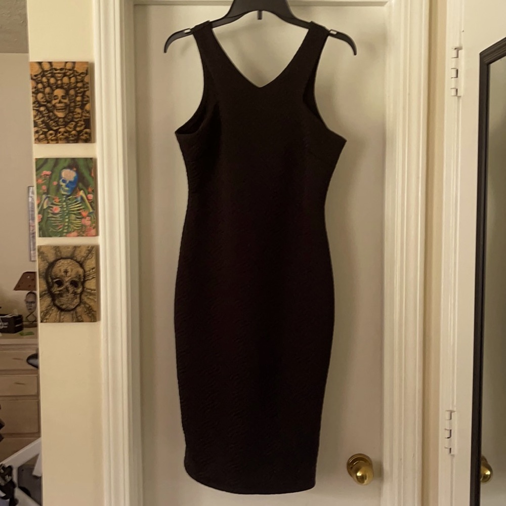 Perfect Little Black Dress that hugs every curve